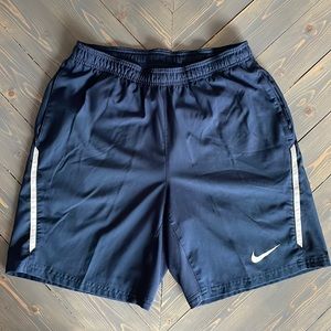 Nike dri-fit navy blue and white shorts, M
